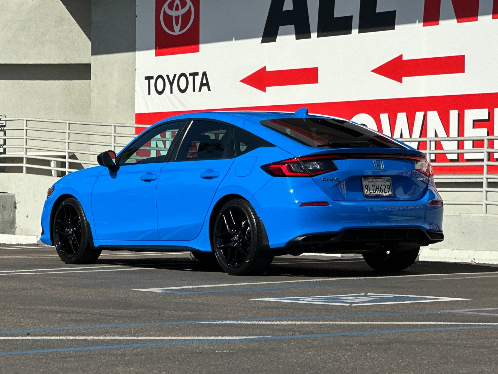 2024 Honda Civic — rear three-quarter view