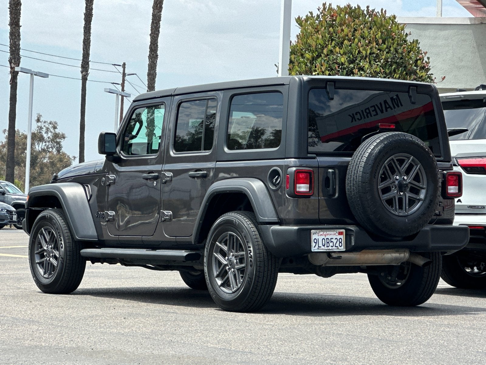 2024 Jeep Wrangler — rear three-quarter view