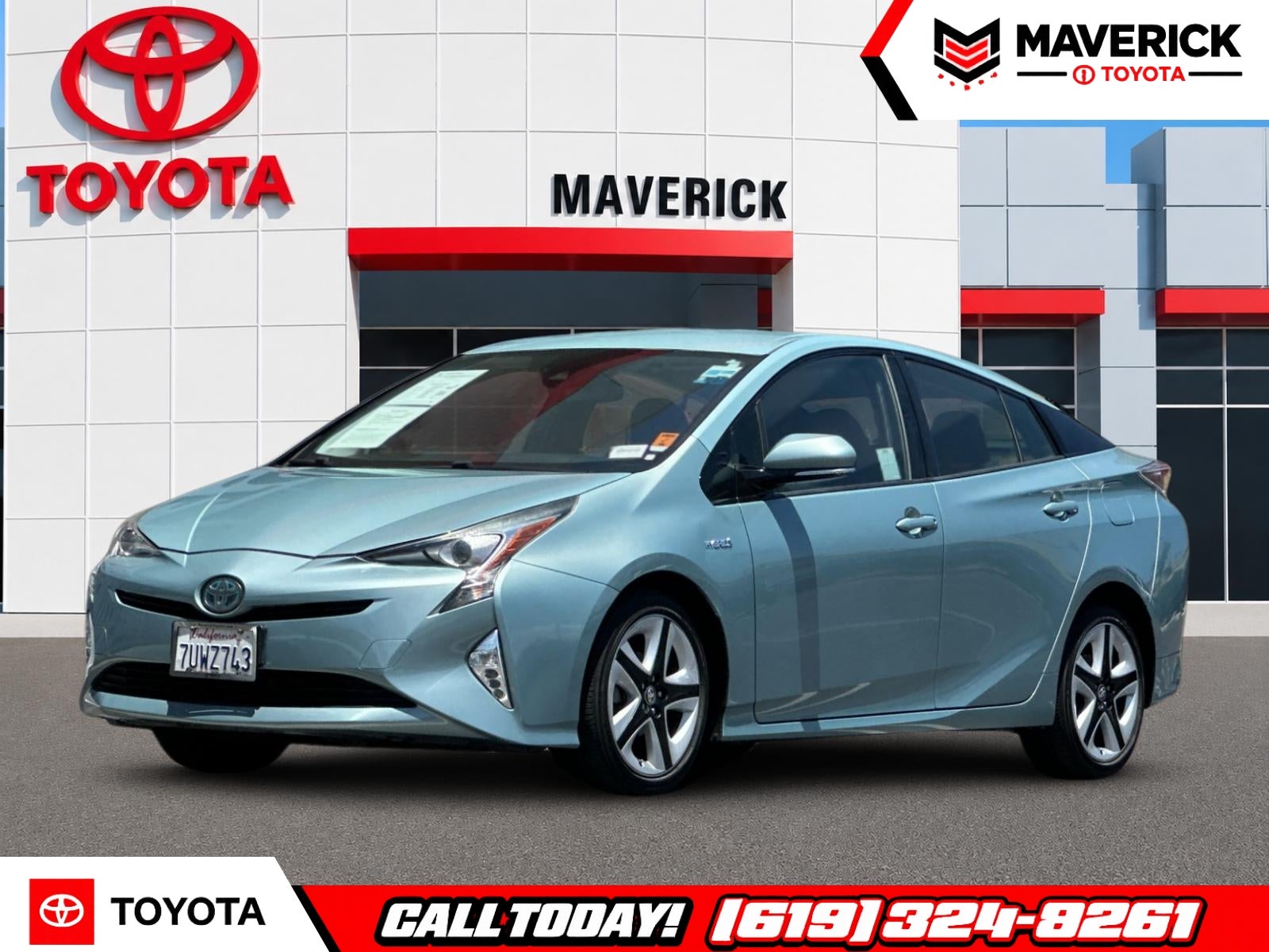 2016 Toyota Prius Four Touring in Pearl — front three-quarter view